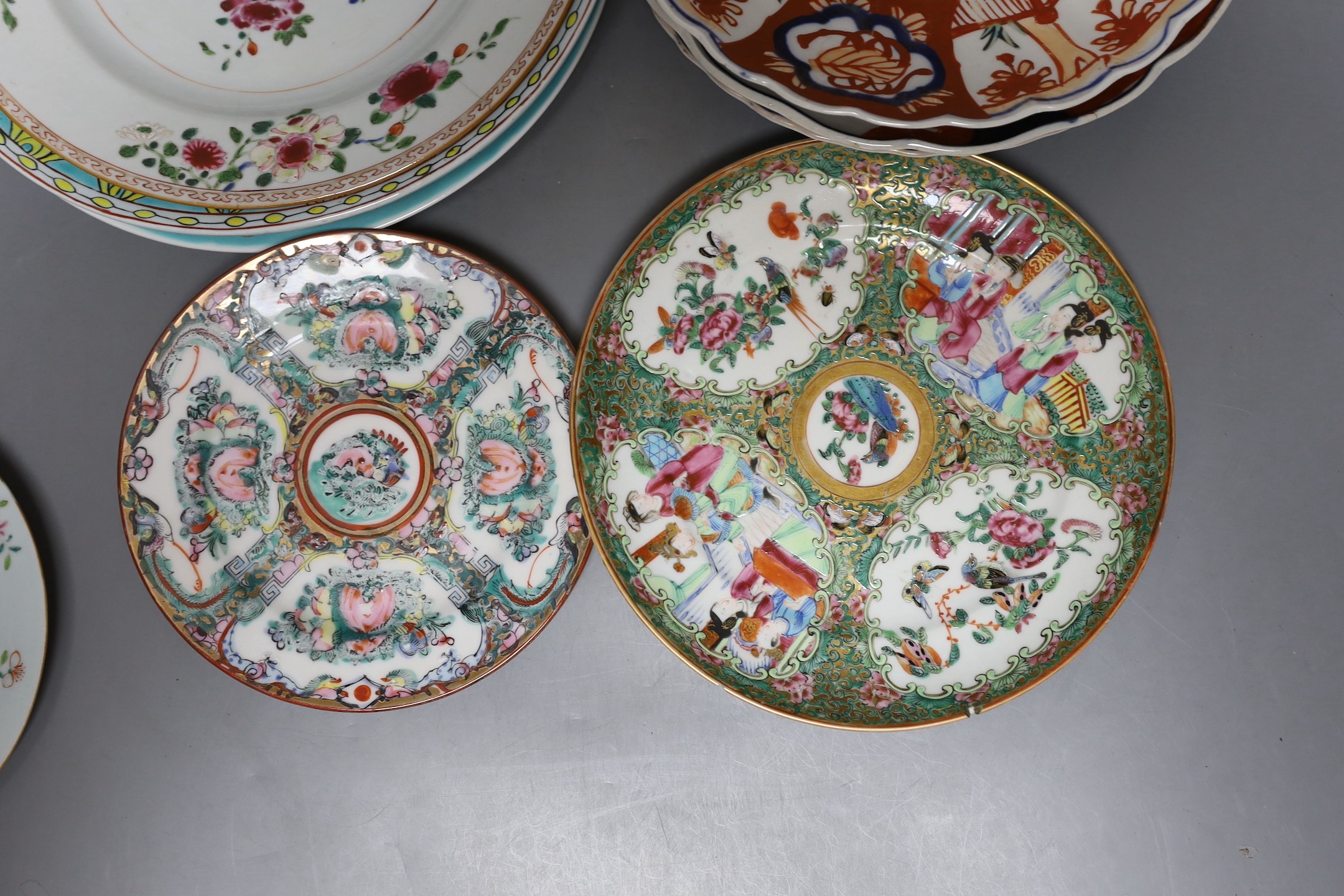 A collection of Chinese 19th and 20th century plates, together with Japanese Imari plates.
